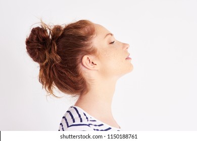 Profile view of woman's face at studio shot 
