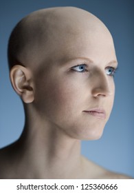 Profile View Of A Young Bald Woman