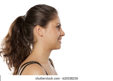 Profile Of Young Beautiful Woman With A Pony Tail