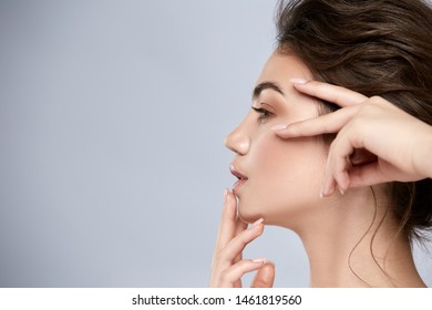 Profile Of Young And Beautiful Woman Touching Face With Light Make-up, Progiled Girl Shot With Perfect Nose