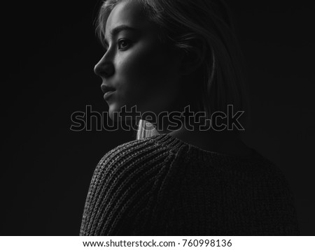 Profile of a young woman. Black and white