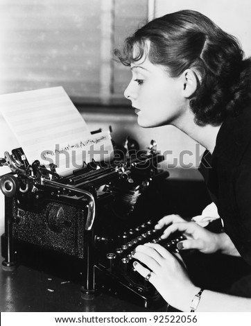 Profile of a young woman typing musical notes with a typewriter