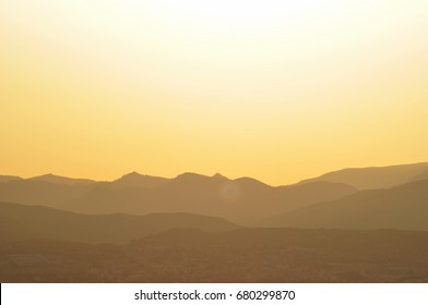 profiles of mountains at dawn