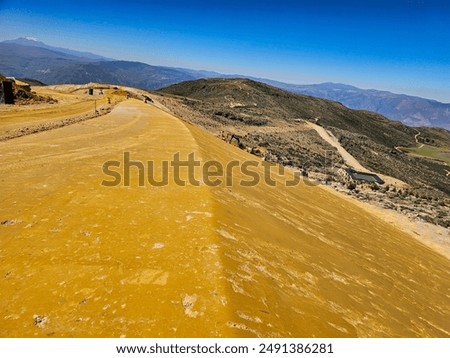 Profiling and compaction of slopes in open pit mine.