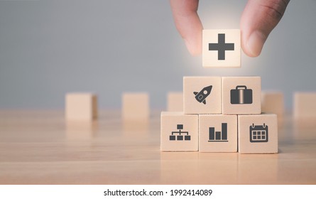 profit and benefit positive concept, Businessman offer positive thing (such as profit, benefits, development, CSR) represented by plus sign and business growth icon.