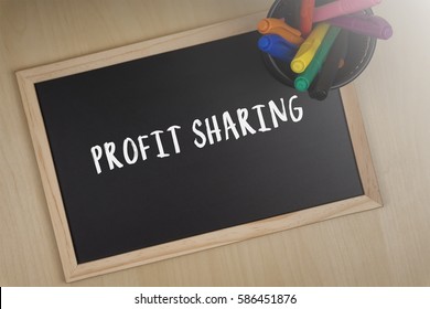 Profit Sharing Words Writing On Chalkboard.