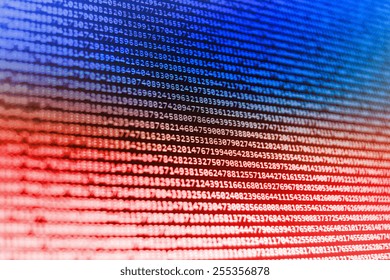 Program source code on monitor screen. Blue and red color.