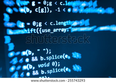 Program source code on monitor screen. Blue color.
