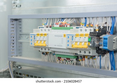 Programmable logic controller, automatic input of power reserve in the electrical cabinet. Close-up, selective focus.