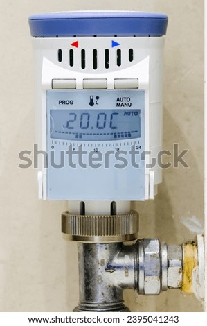 Programmable thermostatic radiator valve (TRV) set to 20C, allowing different temperatures to be selected at different times.
