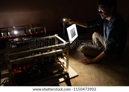 Programmer configures a computer for crypto currency mining
