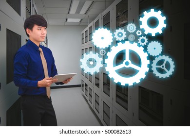 Programmer in data center room with gear system