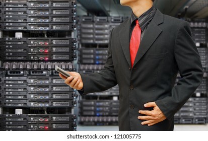 Programmer in data center room and Log in screen activated for security