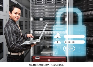 Programmer in data center room and Login screen activated for security - Powered by Shutterstock - Get 15% off with code: PIKWIZARD15