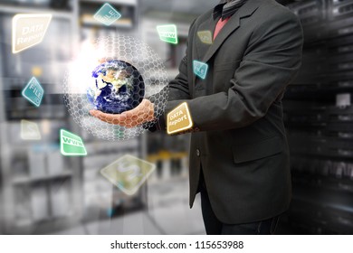 Programmer in data center room and take control the digital world : Elements of this image furnished by NASA