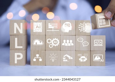 Programmer or developer is arrange commands or operations of NLP or natural language processing on wooden block into packaged software for use in data analysis or as a business planning assistant.