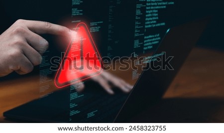 Programmer developer, staff businessman using computer laptop programming access security alert caution warning triangle sign, issued ungranted access online internet cybercrime.