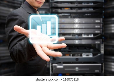 Programmer with Graph icon in server room