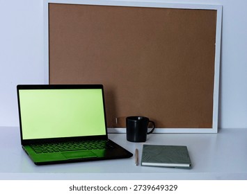 Programmer or hacker working on multiple green screen monitors in home office