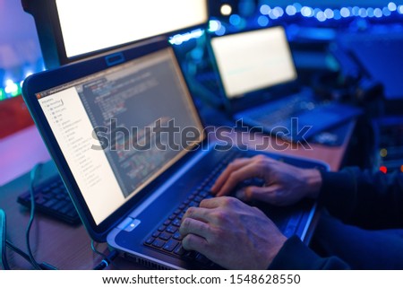 Programmer hands on keyboard, network security