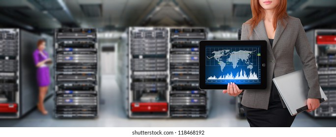 Programmer hold tablet in data center room