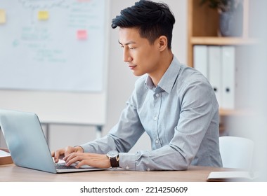 Programmer, Laptop And Software Engineer Working, Coding And Typing Up Cyber Security Data On The Internet. Digital, Web Design And Young Asian Businessman Busy With An Email Message In An Office