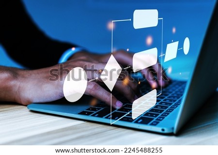 IT programmer people hand working on laptop computer with digital flowchart database diagram, workflow automation, software development, program developer, technology, software engineer concept