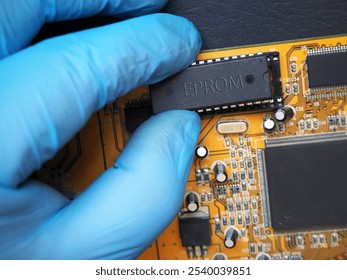 Programmer places the EPROM. One-time programmable Read Only Memory on the electronic circuit board.