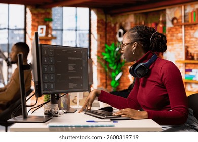 Programmer solving tasks with AI LLM chatbot answering prompts using predictive technology. Startup company worker using computer to interact with large language model program