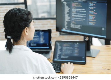 IT Programmer Starts Working on Desktop Computer. The Website Developer, Software Engineer Developing App, Video Game. Terminal with Coding Programming Language.