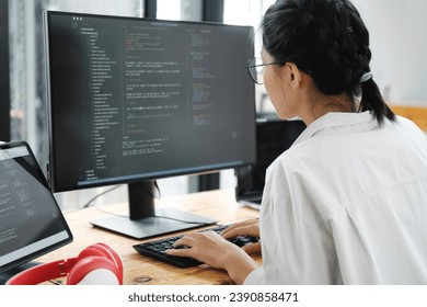 IT Programmer Starts Working on Desktop Computer. The Website Developer, Software Engineer Developing App, Video Game. Terminal with Coding Programming Language.