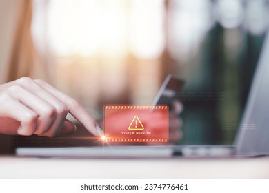 Programmer and virtual icons , exclamation mark ,alarm,computer virus detected ,danger warning concept or information error that should be urgently fixed and repaired ,Notification of security issues 