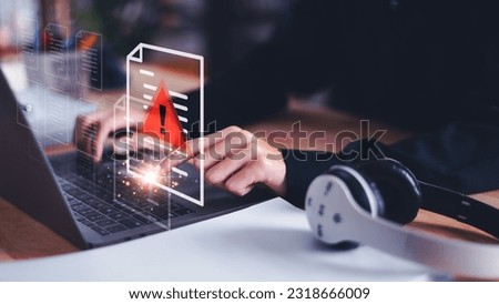 Programmer and virtual icons , exclamation mark ,alarm,computer virus detected ,danger warning concept or information error that should be urgently fixed and repaired ,Notification of security issues 