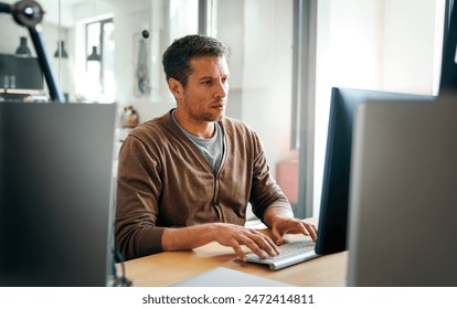 Programmer, web developer, designer working at office comparing mobile and desktop website versions - Powered by Shutterstock