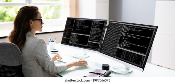 programmer-woman-coding-on-multiple-260n