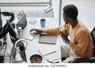 Programmer working on computer in IT office