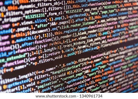 Programmer working in a software develop company office. Web programming and bracket technology background. Key password theft hacking firewall concept Creative Js HTML5 closeup set on background. 