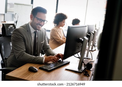 Programmer working in a software developing company - Shutterstock ID 2126716949