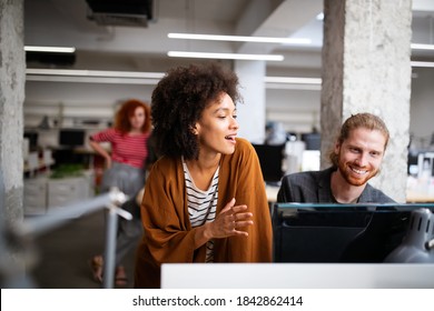 Programmers Cooperating Brainstorming At Information Technology Company