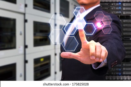 Programmers in data center room and touch the power button 