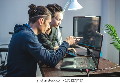 Programmers are developing software by working with software code together. Team work. Modern job of web ux Designer - Shutterstock ID 1781277437