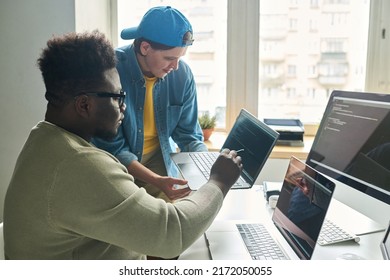 Programmers Developing Software In Team