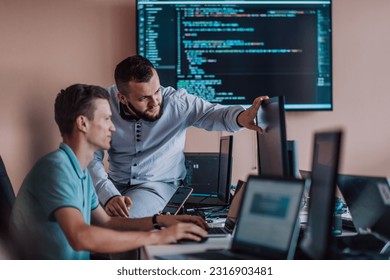 Programmers engrossed in deep collaboration, diligently working together to solve complex problems and develop innovative mobile applications with seamless functionality.