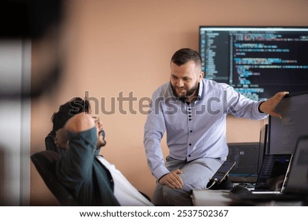 Programmers engrossed in deep collaboration, diligently working together to solve complex problems 