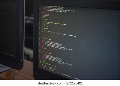 Programming codes, Classroom Computer, Education Empty Classroom Computer Education. Training Programming. Programming codes on computer monitor