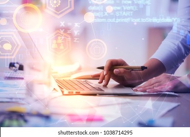 Programming, computing and internet concept. Close up of hands using laptop on abstract background with HTML code. Double exposure 