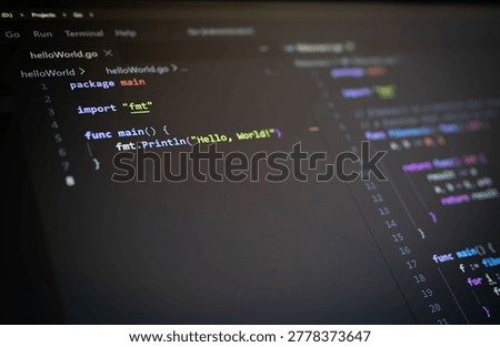Programming interface on dark computer monitor with colorful syntax highlights, representing modern software development, digital technology, cybersecurity, artificial intelligence and coding workspace.