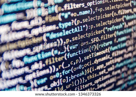Programming Javascript on laptop computer screen Java Software engineer concept. Program code with display. Software development creating projects. Coding cyberspace concept. Coded data on monitor. 
