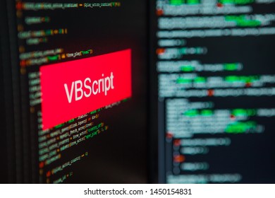 Programming language, VBScript inscription on the background of computer code. Modern digital technologies and programming training