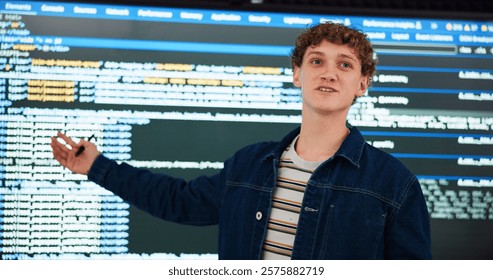Programming lecture, student and man in university for learning, education or teaching ai course. College, class and study coding with data for software development in digital presentation on screen